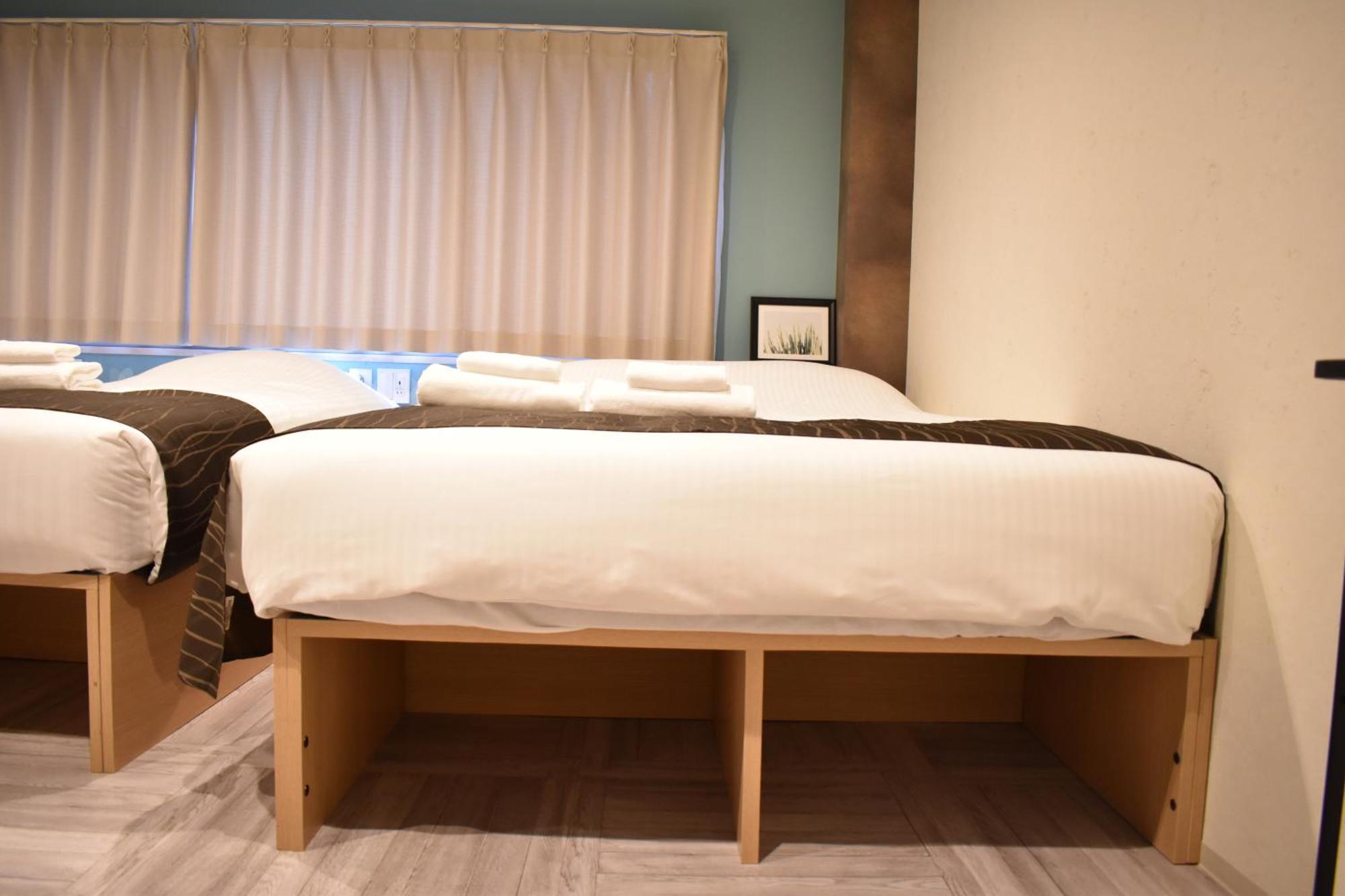 Shinsaibashi House Hotel Osaka Phòng bức ảnh