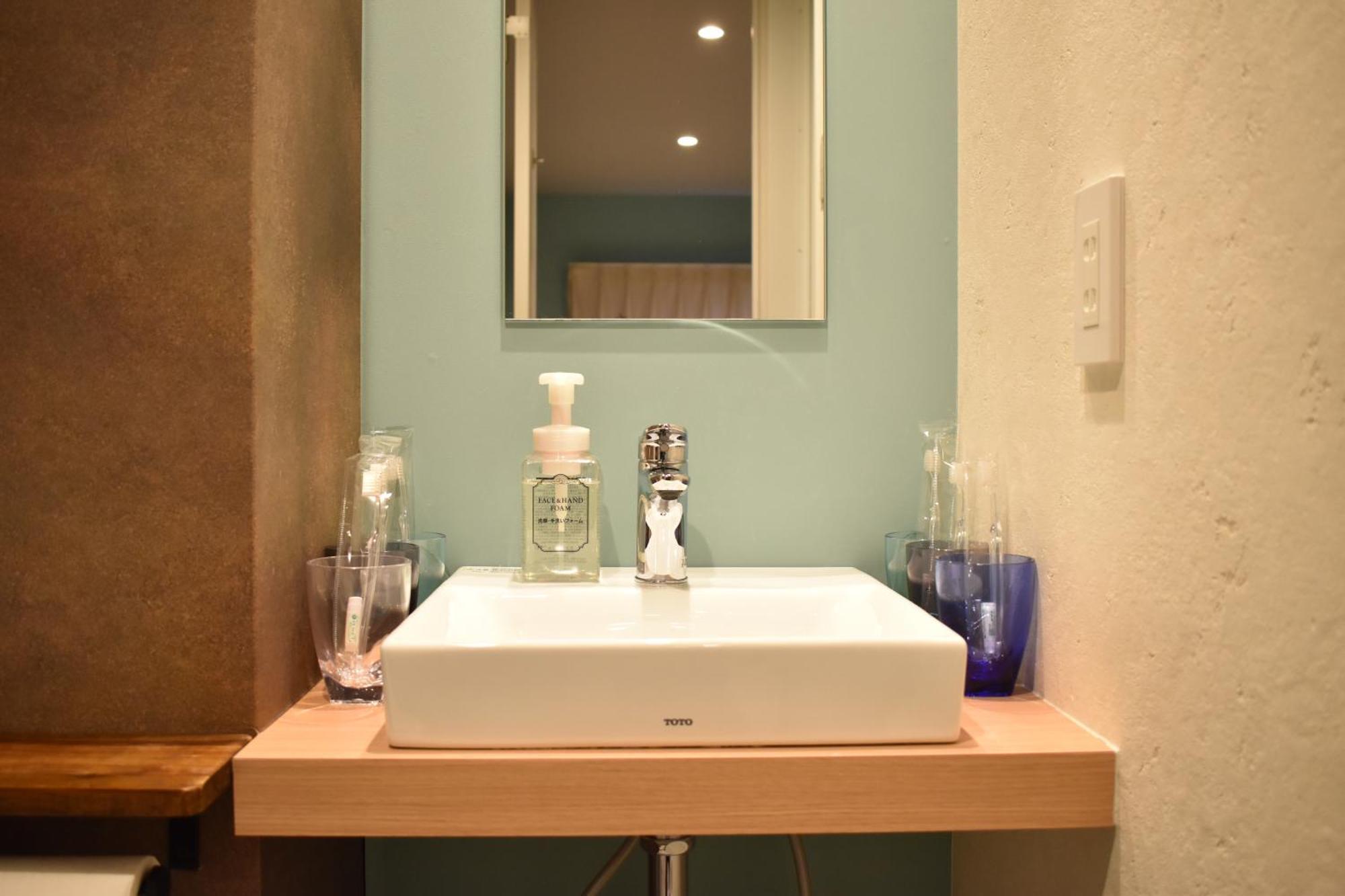 Shinsaibashi House Hotel Osaka Phòng bức ảnh