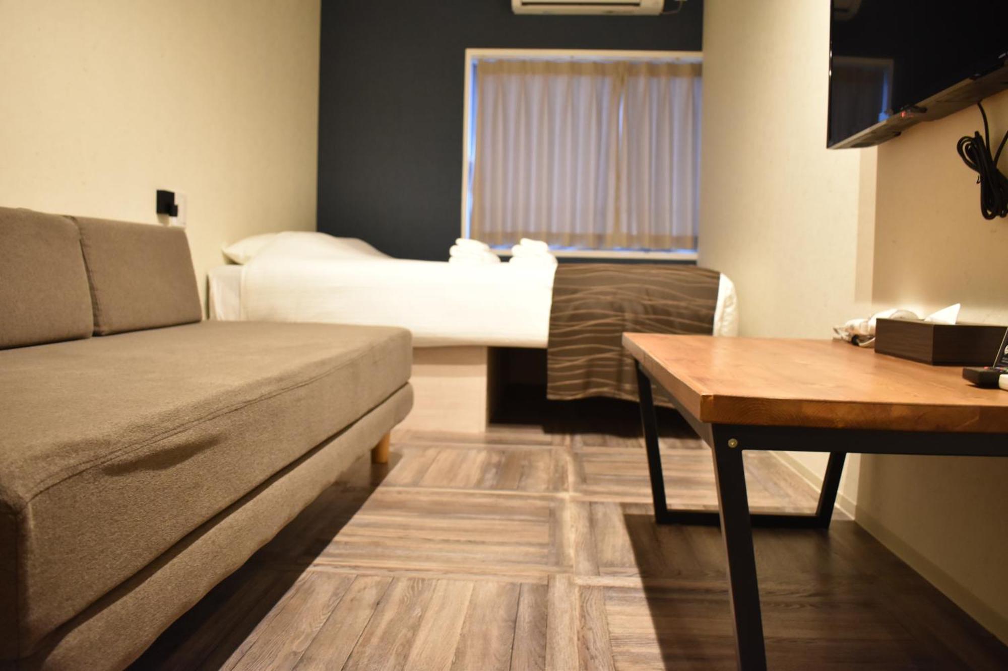Shinsaibashi House Hotel Osaka Phòng bức ảnh