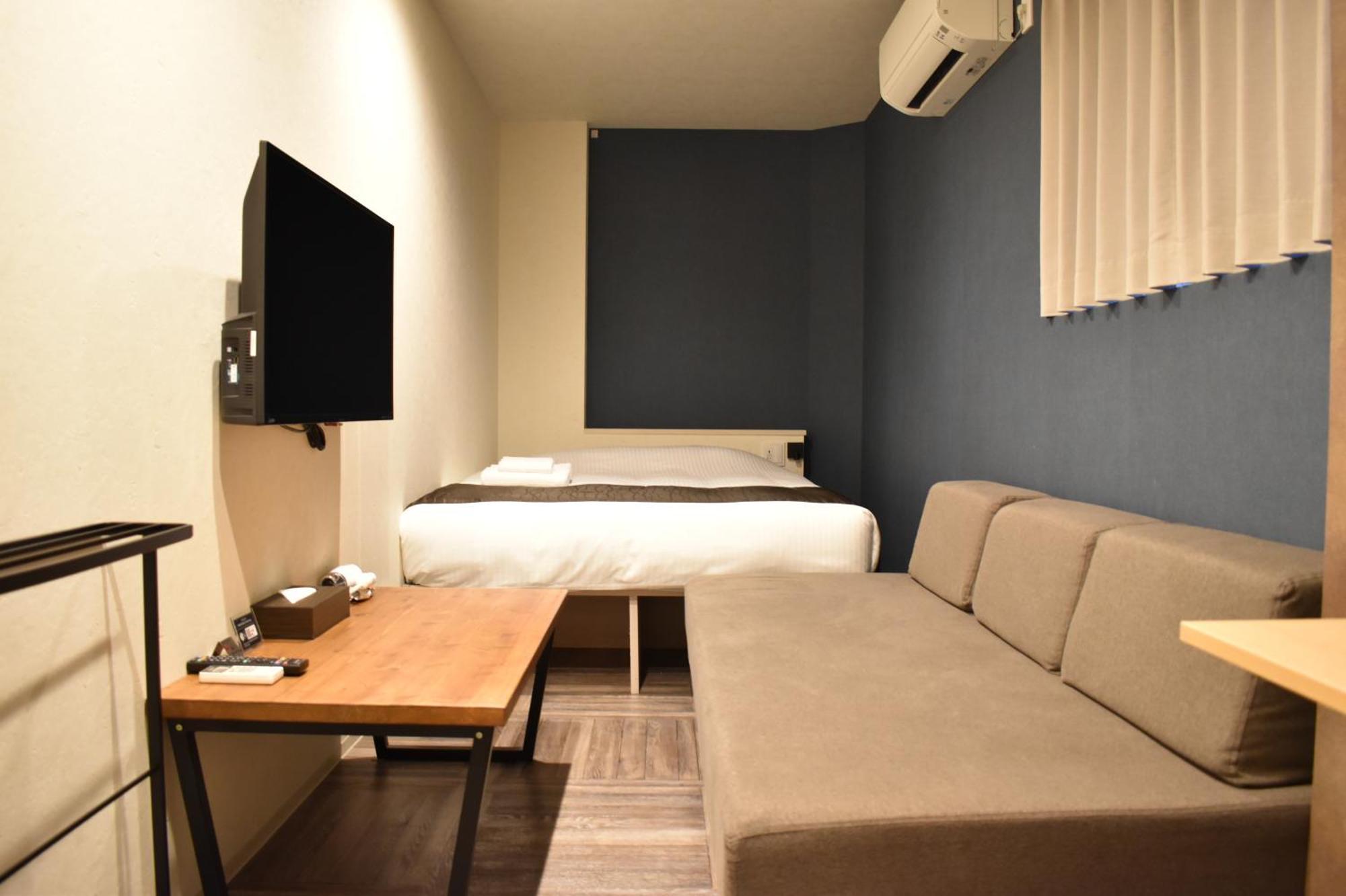 Shinsaibashi House Hotel Osaka Phòng bức ảnh