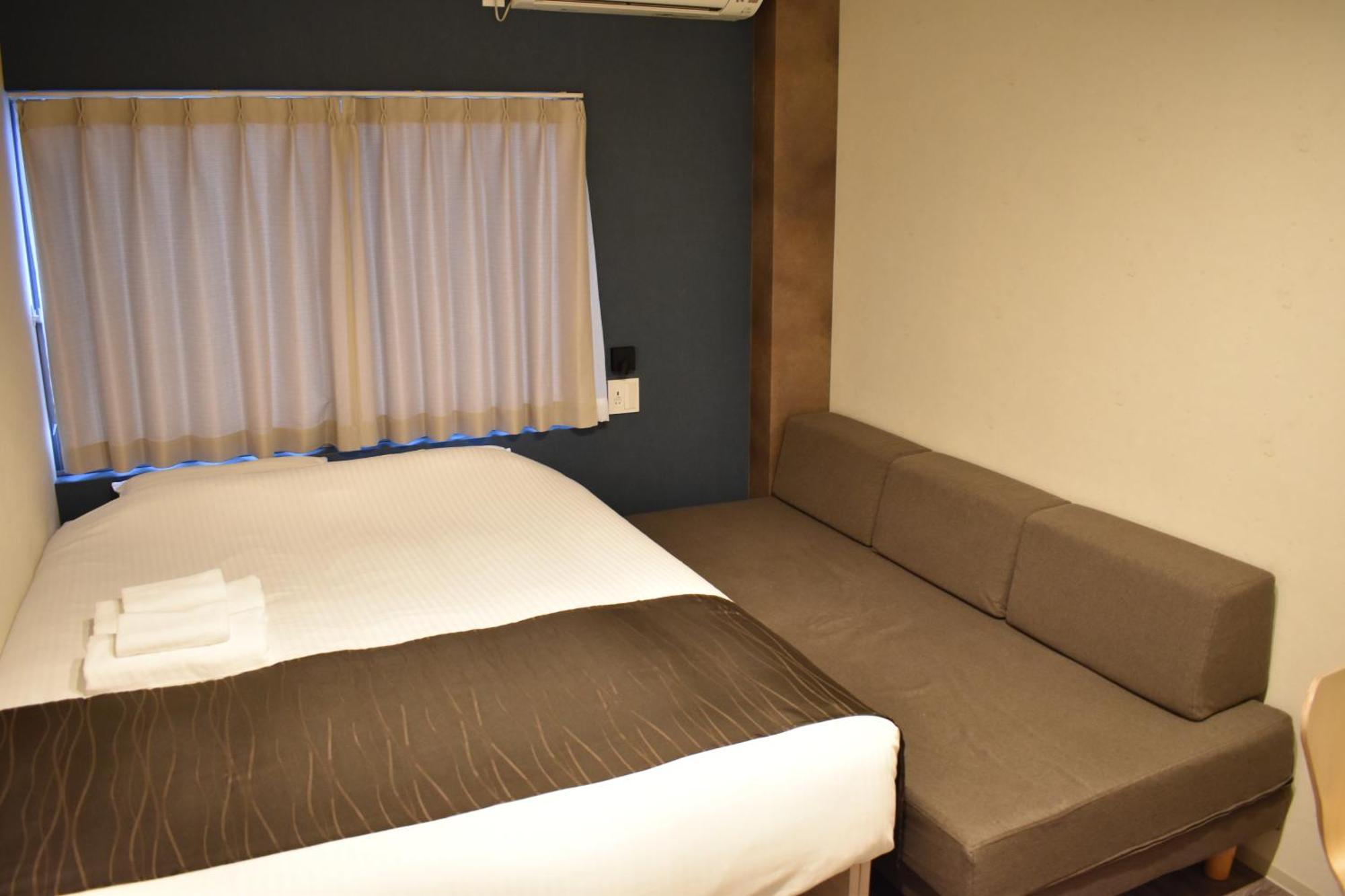 Shinsaibashi House Hotel Osaka Phòng bức ảnh