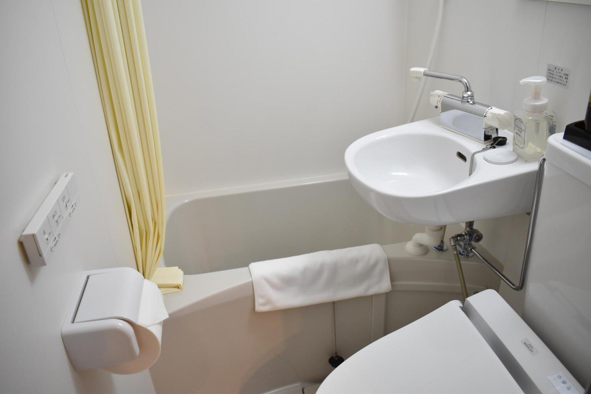 Shinsaibashi House Hotel Osaka Phòng bức ảnh
