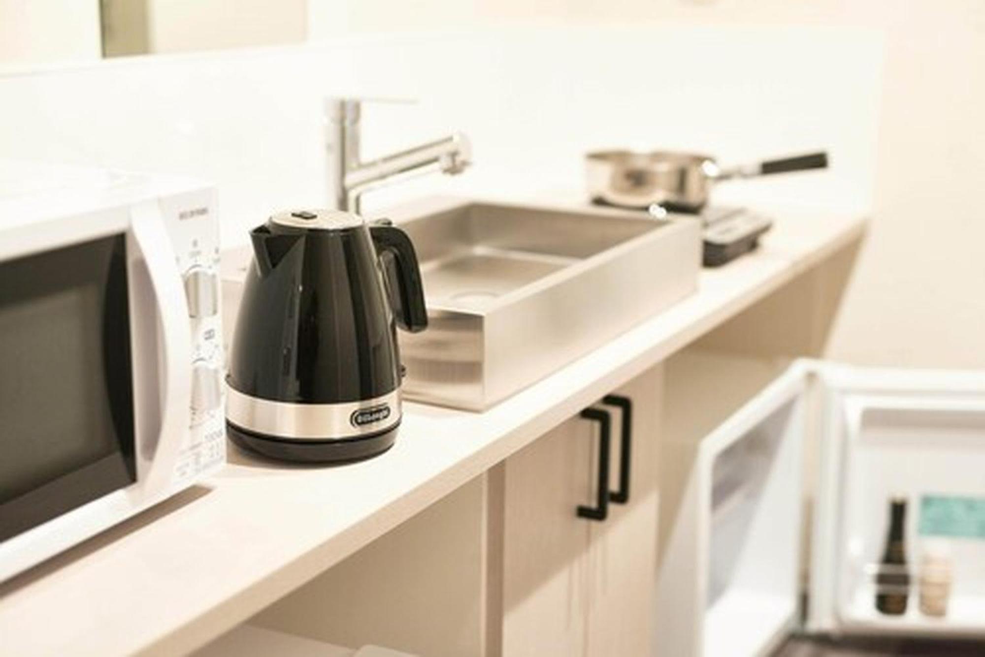 Shinsaibashi House Hotel Osaka Phòng bức ảnh
