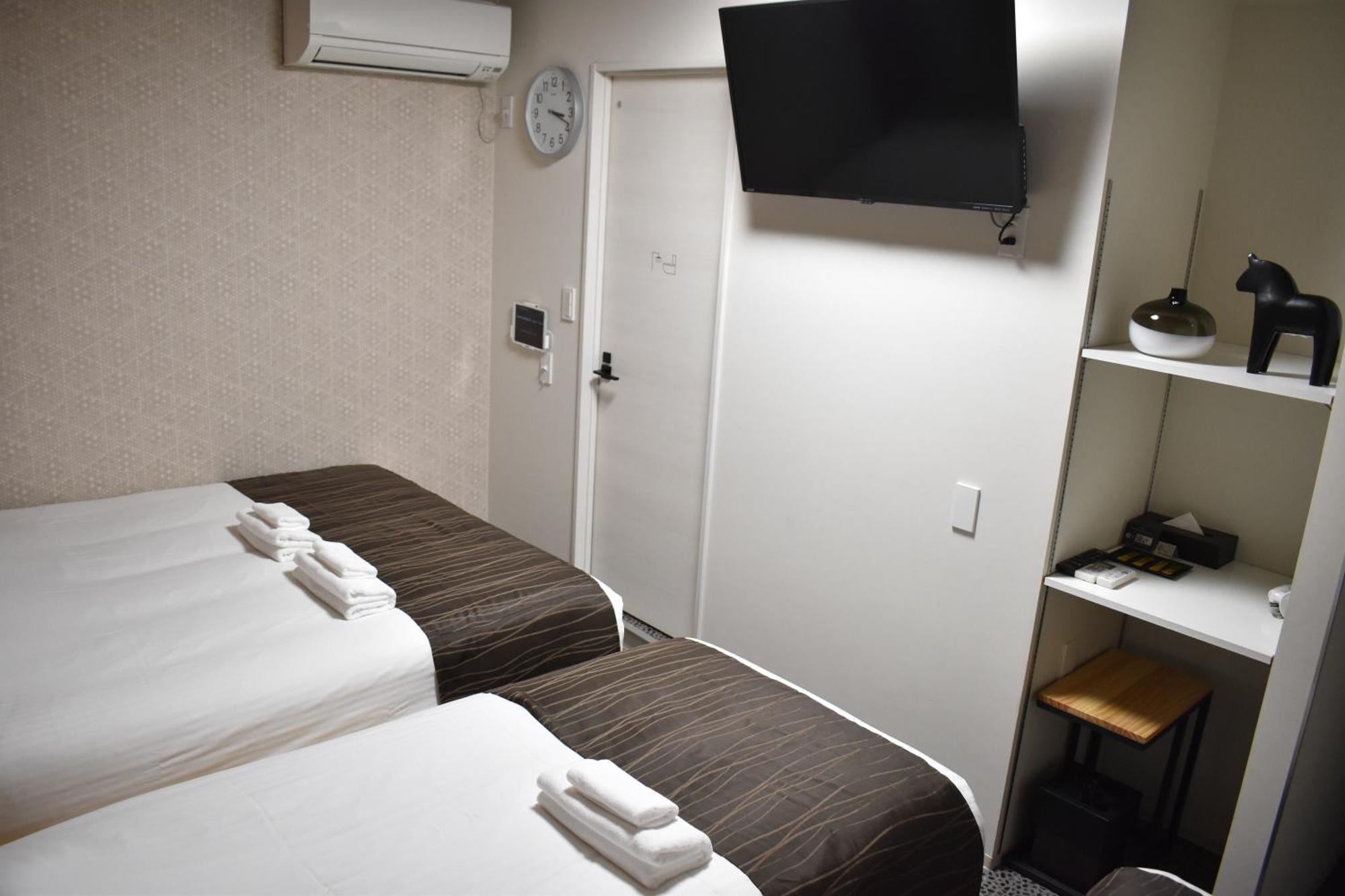 Shinsaibashi House Hotel Osaka Phòng bức ảnh