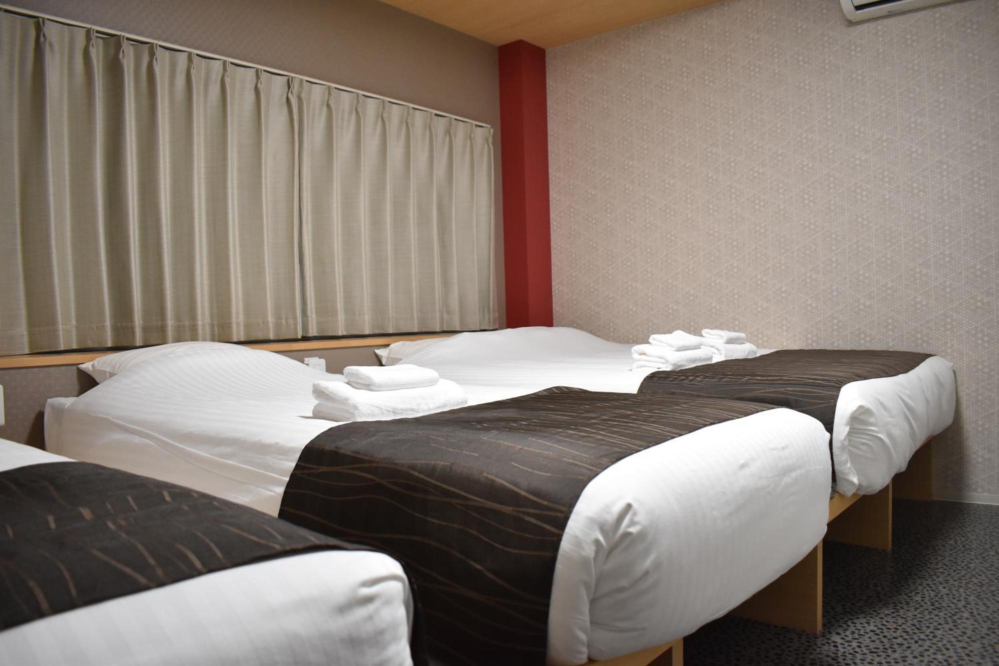 Shinsaibashi House Hotel Osaka Phòng bức ảnh